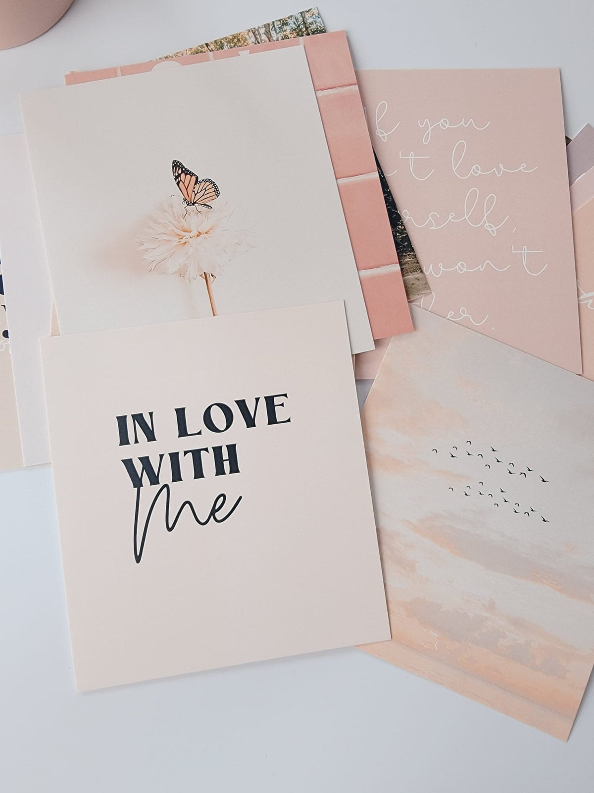 Confidence reminder cards displayed as wall decor in a bedroom or dorm