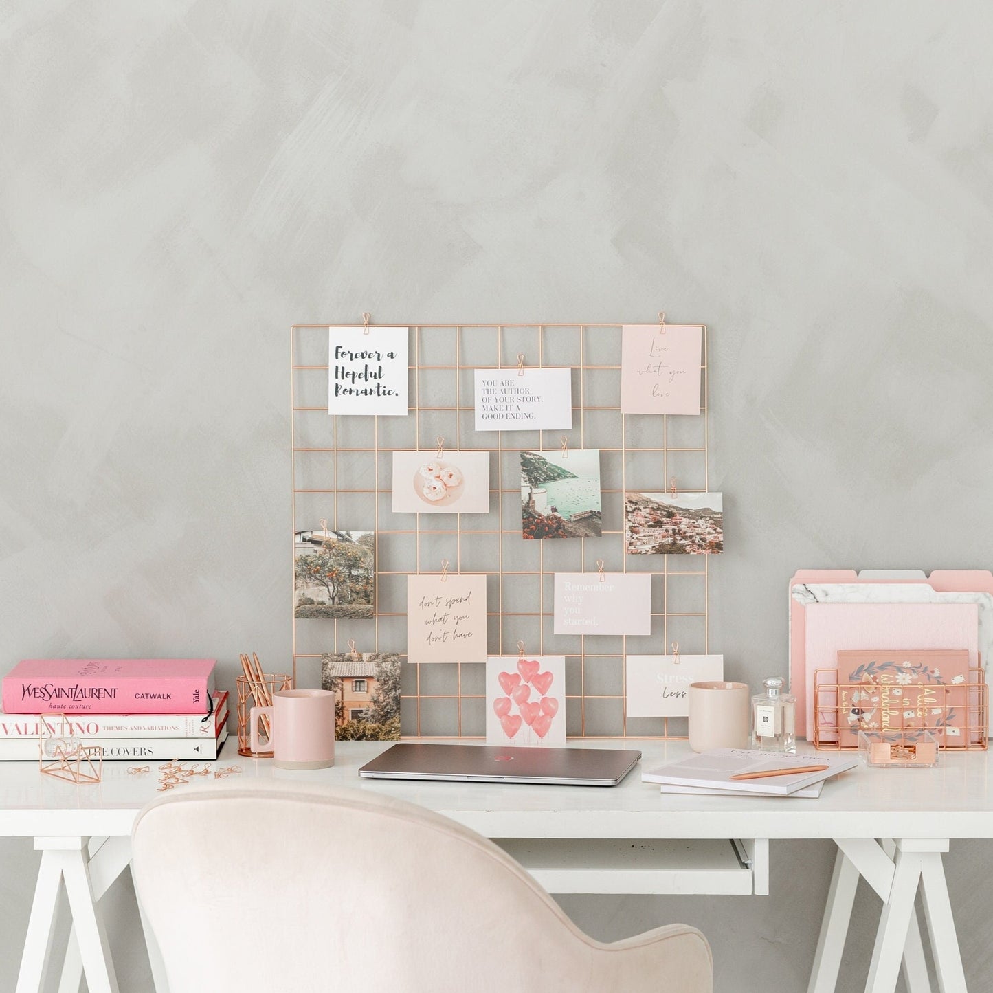 Vision board starter kit with rose gold grid, clips, affirmation cards, and notepad