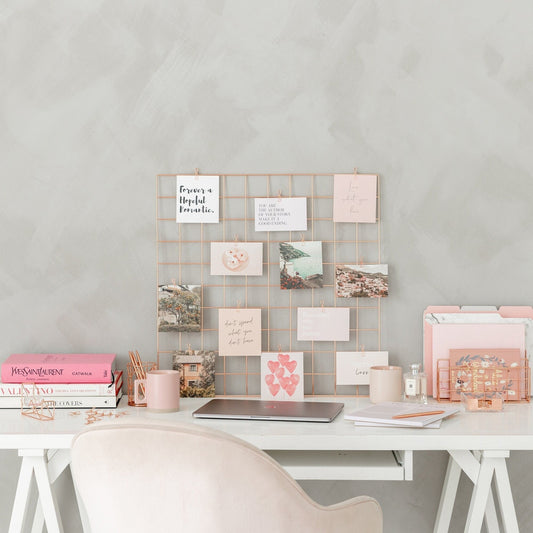 Vision board starter kit with rose gold grid, clips, affirmation cards, and notepad