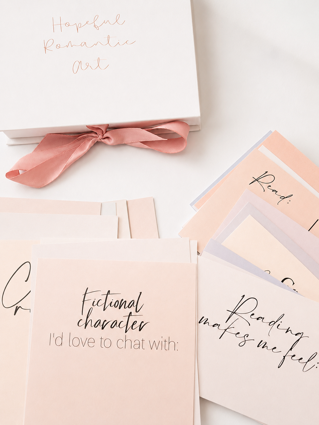Close-up of bookish reading tracker cards for tracking books and reflections