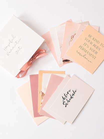 Fitness vision board cards displayed on a desk with wellness planning 