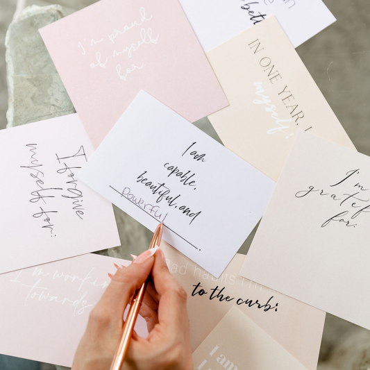 Vision board goal setting cards with fill-in-the-blank prompts in keepsake box