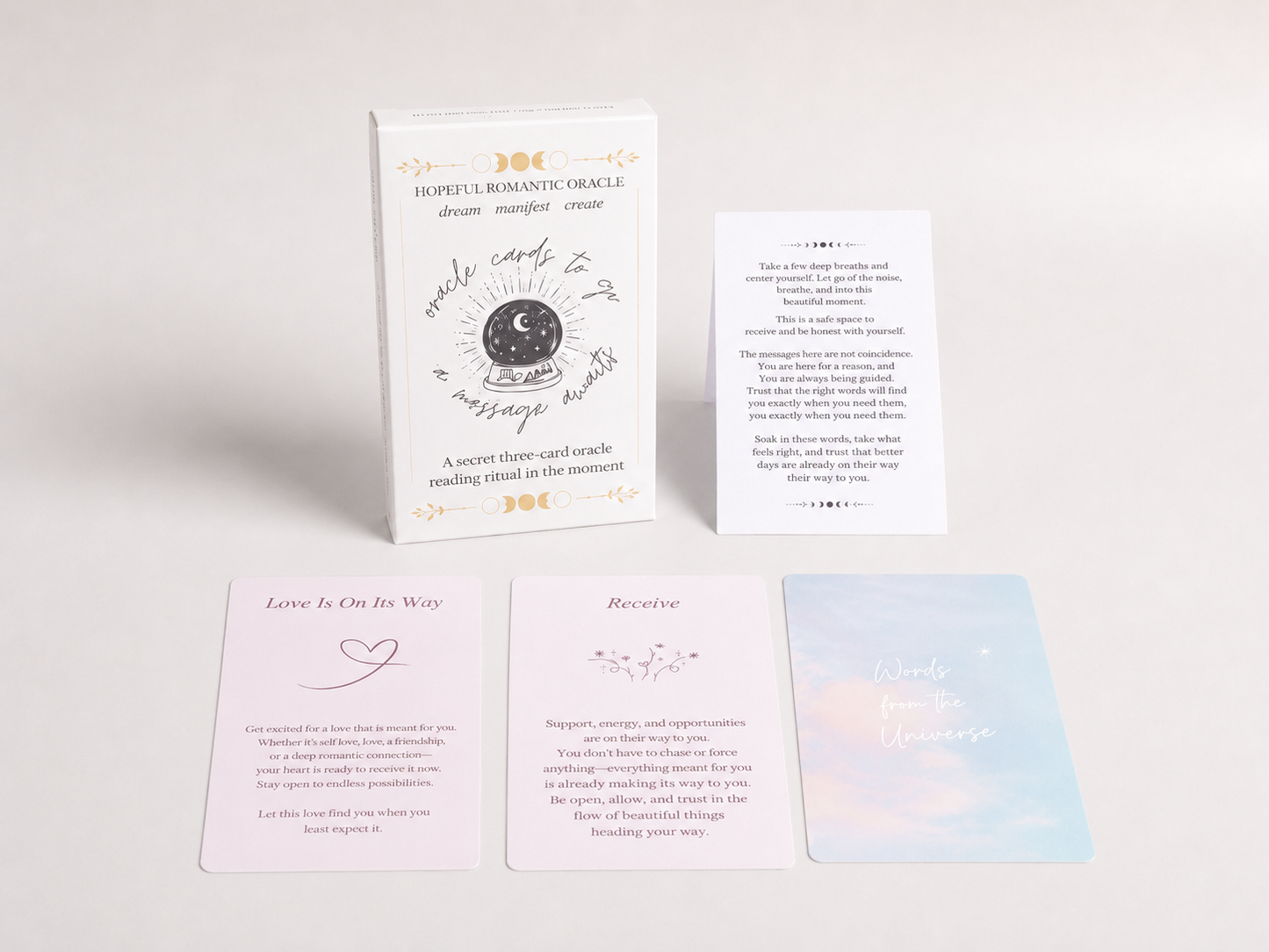 Hopeful Romantic Oracle box with instruction card and three pastel oracle cards displayed on a soft white background