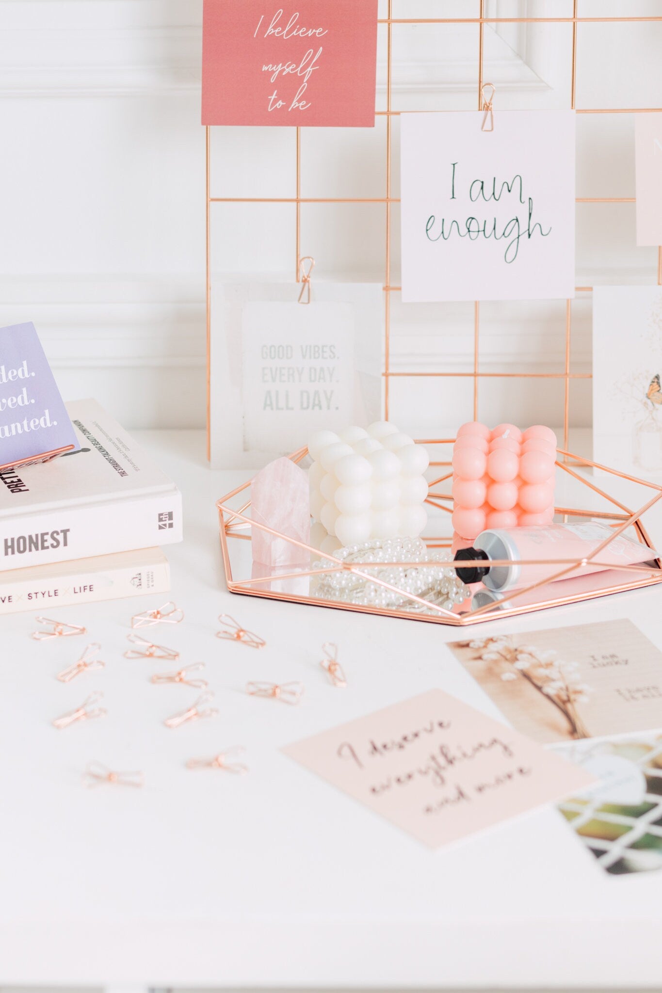 Manifestation cards displayed on a desk for journaling and intention setting