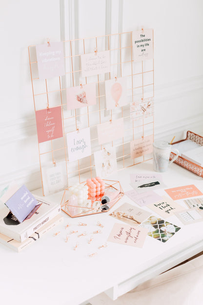 Close-up of manifestation image cards for a dreamy mood board