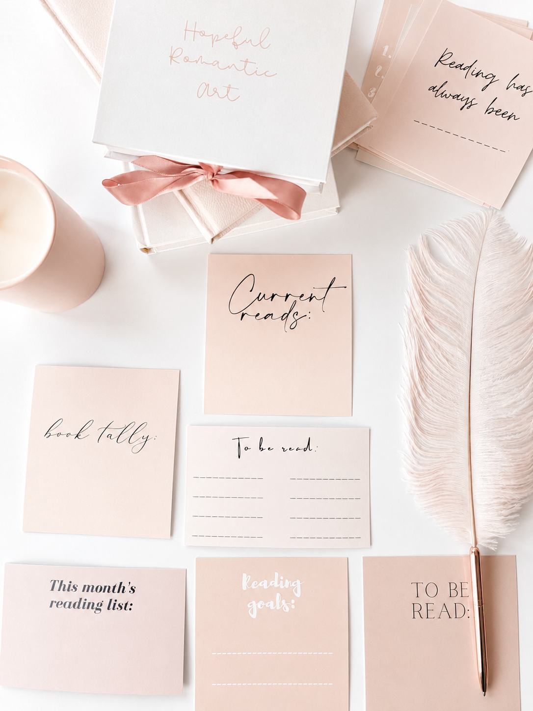 Stack of reading tracker cards with fill-in-the-blank book log designs