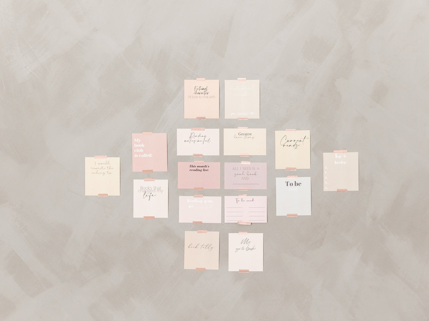 Full spread of reading tracker cards arranged on a soft neutral background