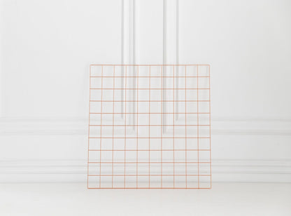 Rose gold wall grid shown on a clean white background