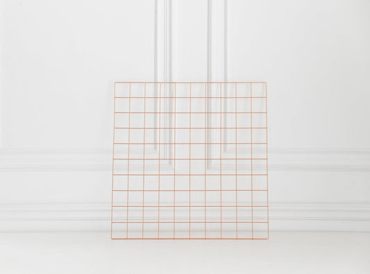 Rose gold wall grid shown on a clean white background