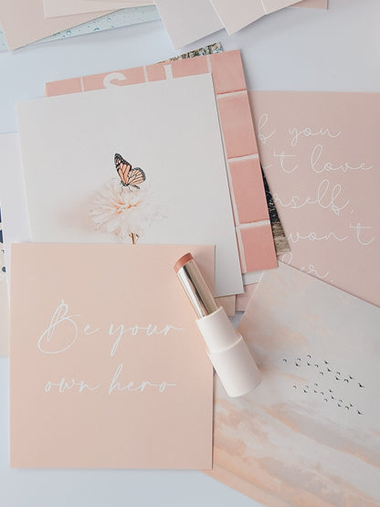 Self-love cards styled with a journal for affirmations and reflection