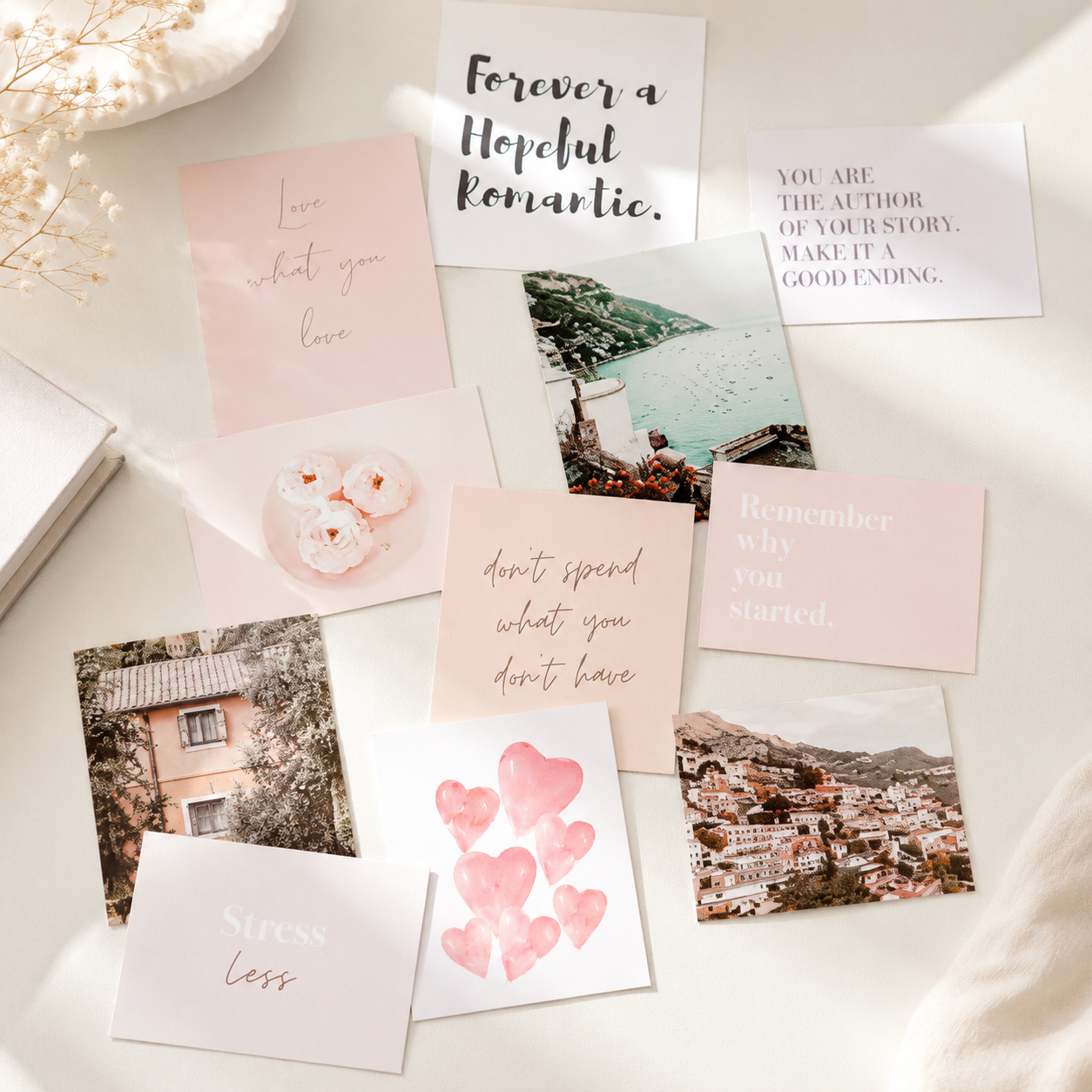 Vision board card starter set arranged in a soft pastel flat lay with quote cards and image cards
